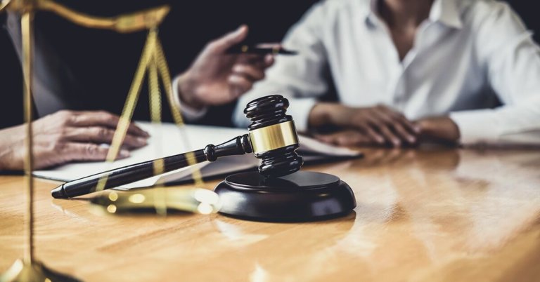 Two lawyers sitting at a table