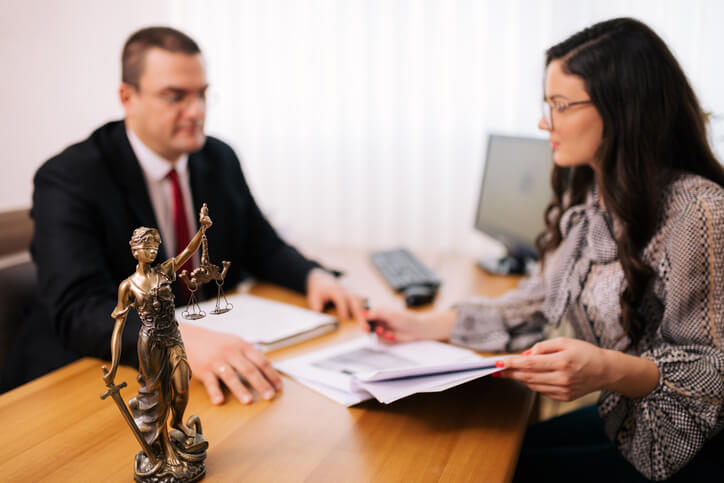 Client sitting with family law attorney